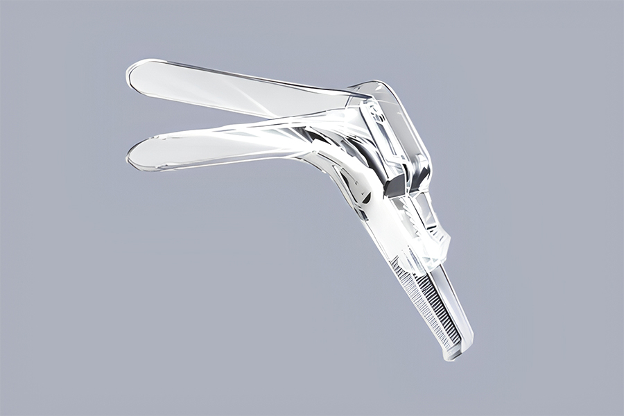 Disposable illuminated vaginal speculum